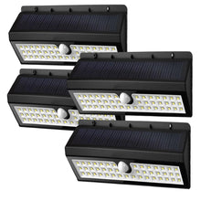 Load image into Gallery viewer, Solar Garden Lights 44 Bright Leds Outdoor Motion Sensor Lights Waterproof And Wireless For Garden Path, Backyard Lighting, Motion Security Lights, Driveway, Stairs, Fence, Deck - Set Of 4